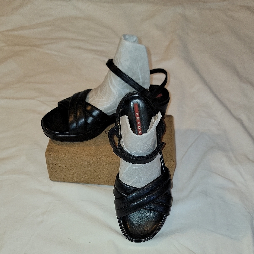 PRADA Stylish Black Leather Sandals with Velcro Ankle Strap and Cutout Design